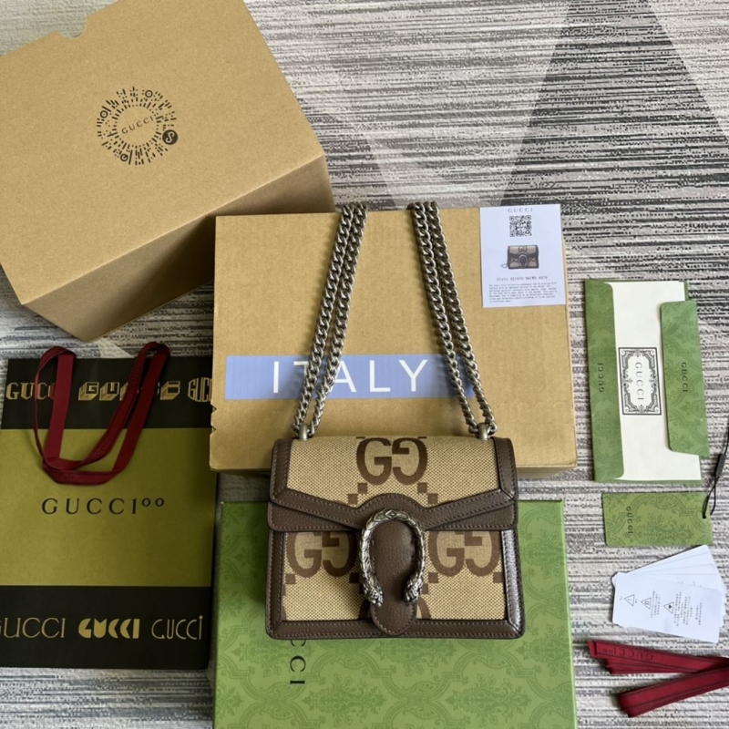 G*u*i top handle bags